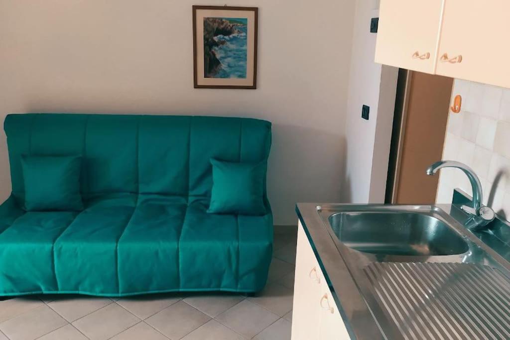 Nisportino, Elba. Bilocale Con Patio Vista Mare. Villa Casa Castagno Bagian luar foto