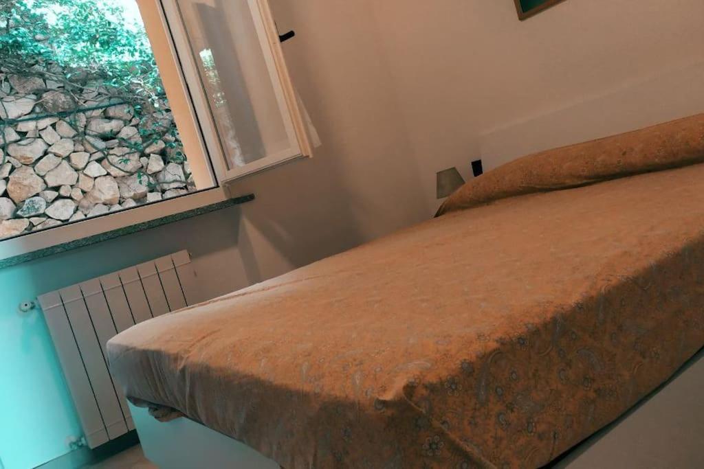 Nisportino, Elba. Bilocale Con Patio Vista Mare. Villa Casa Castagno Bagian luar foto