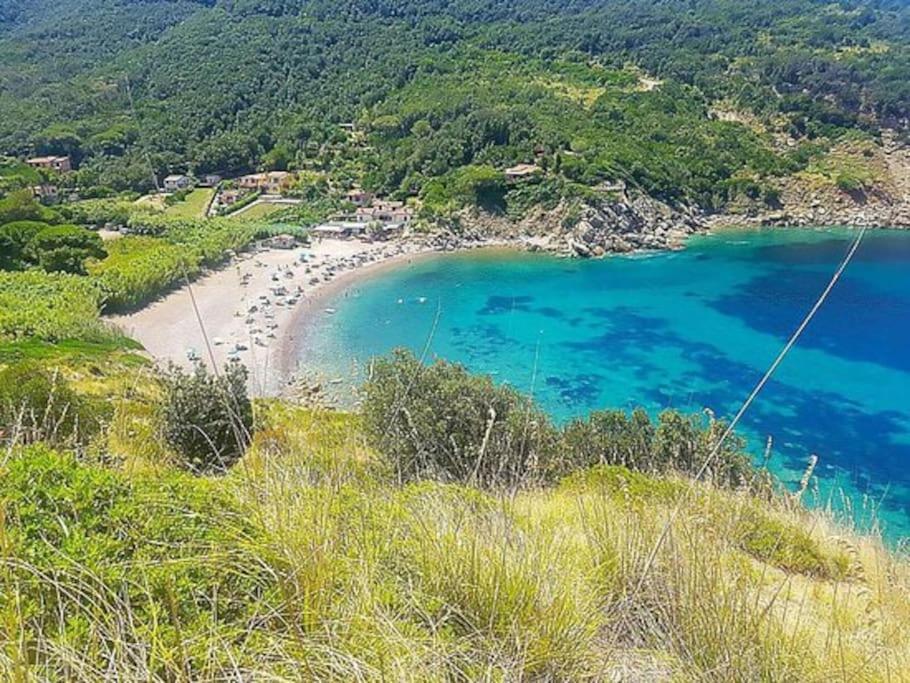 Nisportino, Elba. Bilocale Con Patio Vista Mare. Villa Casa Castagno Bagian luar foto